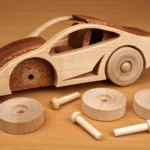 25-14-wood-racer-spielzeug-deko-laubsaege-dekupiersaege-vorlage-rad-auf-duebel-stecken-leim-in-bohrloch-einkleben-abstand-beachten