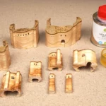 28-21-luftschloesser-aus-holz-deko-laubsaege-bandsaege-vorlage-teile-oberflaechenbehandlung-holzoel-natur-auftragen-pinsel