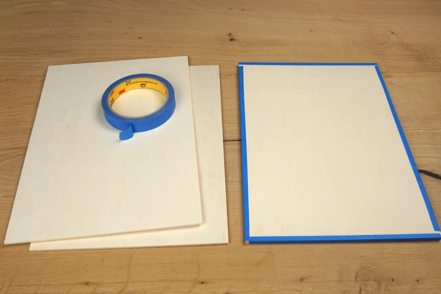 33-01-schneeflockenanhaenger-weihnachten-laubsaege-dekupiersaege-vorlage-sperrholzplatten-stapel-blue-tape