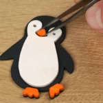 33-19a-pinguin-mobilie-kinder-laubsaege-dekupiersaege-vorlage-schnabel-fuesschen-aufkleben