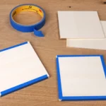 34-06-pastellige-osterhaenger-deko-laubsaege-dekupiersaege-vorlage-zwei-sperrholzplatten-stapel-blue-tape