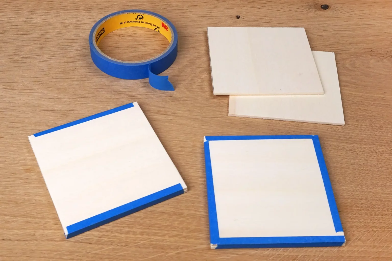 34-06-pastellige-osterhaenger-deko-laubsaege-dekupiersaege-vorlage-zwei-sperrholzplatten-stapel-blue-tape