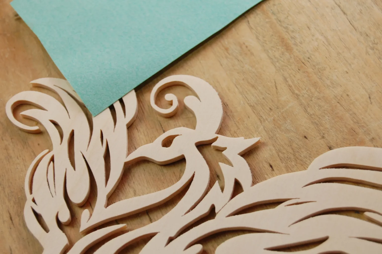 22-04-phoenix-aus-der-asche-deko-laubsaege-dekupiersaege-vorlage-verputzen-schleifen-schleifpapier