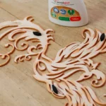 22-08-phoenix-aus-der-asche-deko-laubsaege-dekupiersaege-vorlage-abstandhalter-aufkleben-rueckseite-motiv-leim