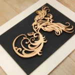 22-10-phoenix-aus-der-asche-deko-laubsaege-dekupiersaege-vorlage-hintergrundplatte-anbringen