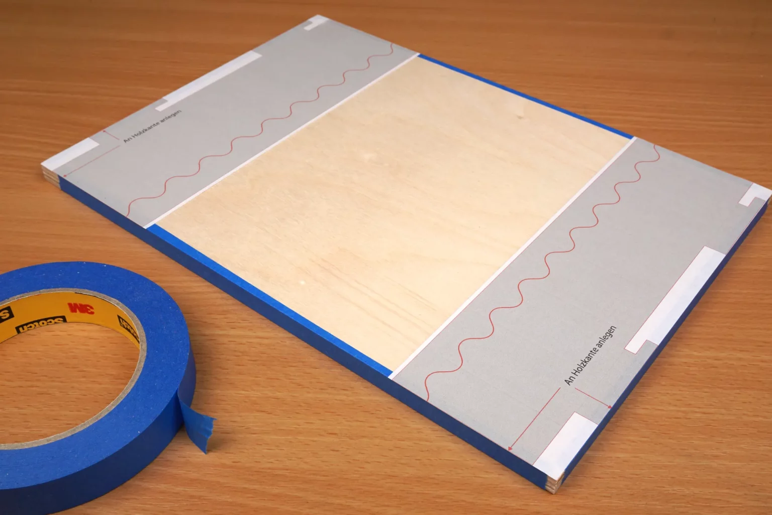 24-02-rettet-den-ozean-spielzeug-laubsaege-dekupiersaege-vorlage-umrandung-sperrholz-blue-tape-stapel-fixieren-vorlagenpapier-aufkleben