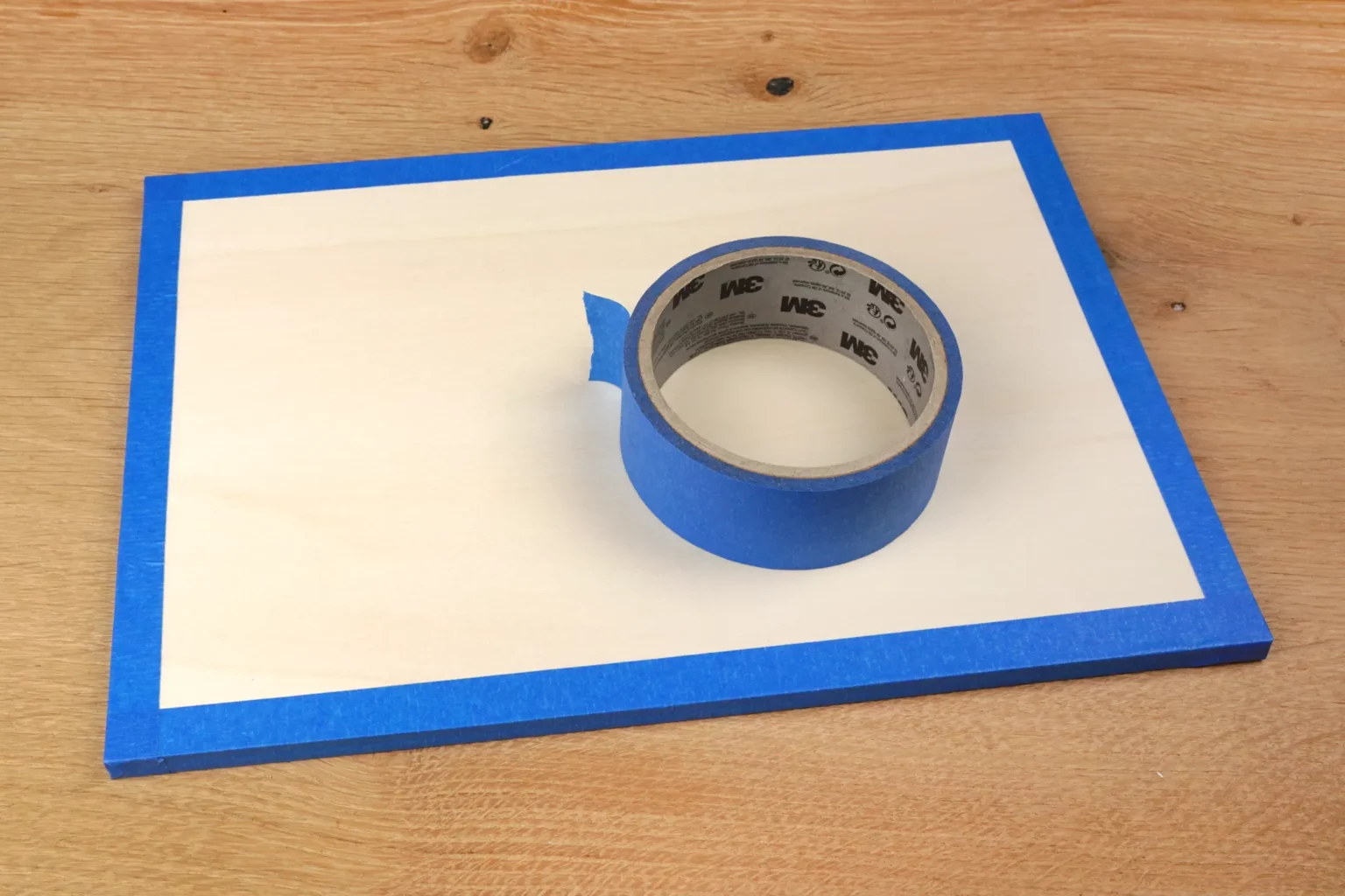 39-02-la-dolce-vita-wandbild-laubsaege-dekupiersaege-vorlage-sperrholzplatten-blue-tape-stapel-fixieren