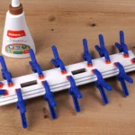 39-16-flaschenschiff-aufsteller-deko-laubsaege-dekupiersaege-vorlage-sockelteile-verleimen-spannen-spannklemmen