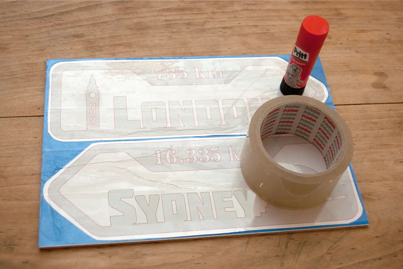 12-02-neu-weltenbummler-schilder-deko-laubsaege-dekupiersaege-vorlage-vorlage-aufkleben-ueberkleben-klebeband-transparent