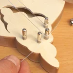 12-24-tuerharfe-deko-diy-laubsaege-dekupiersaege-vorlage-saiten-zuschneiden-auffaedeln-verklemmen-spannen