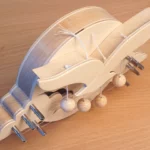 12-28-tuerharfe-deko-diy-laubsaege-dekupiersaege-vorlage-holzkugeln-positionieren-verknoten