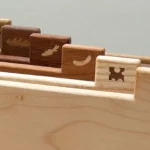 12-titel-02-schneidebrettchen-mit-halterung-laubsaege-dekupiersaege-vorlage