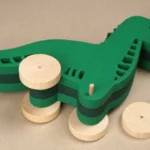 42-16-nachziehtier-dino-spielzeug-kinder-laubsaege-dekupiersaege-vorlage-achsstaebe-durchstecken-raeder-verleimen